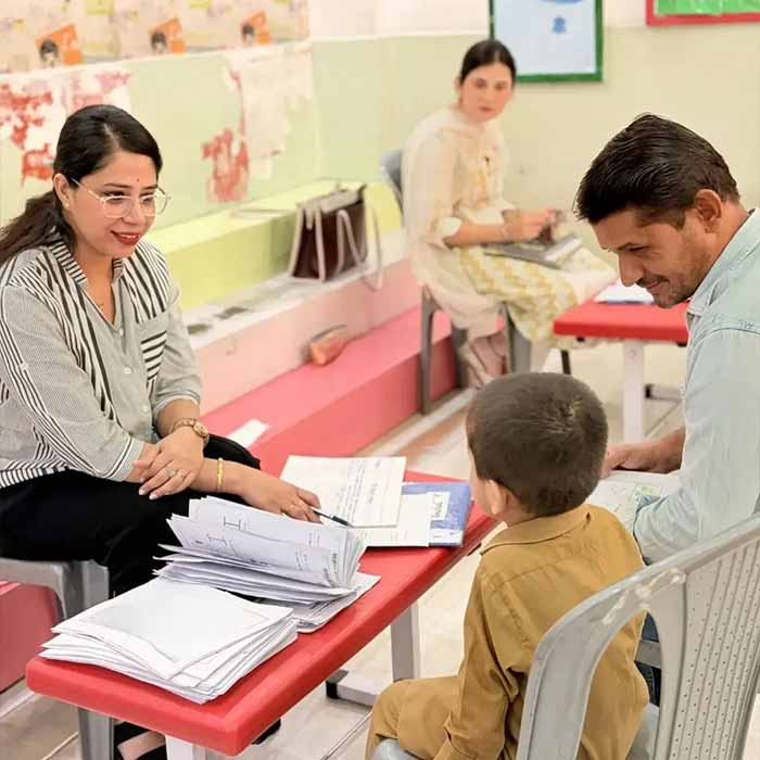 Teacher reading a story to children